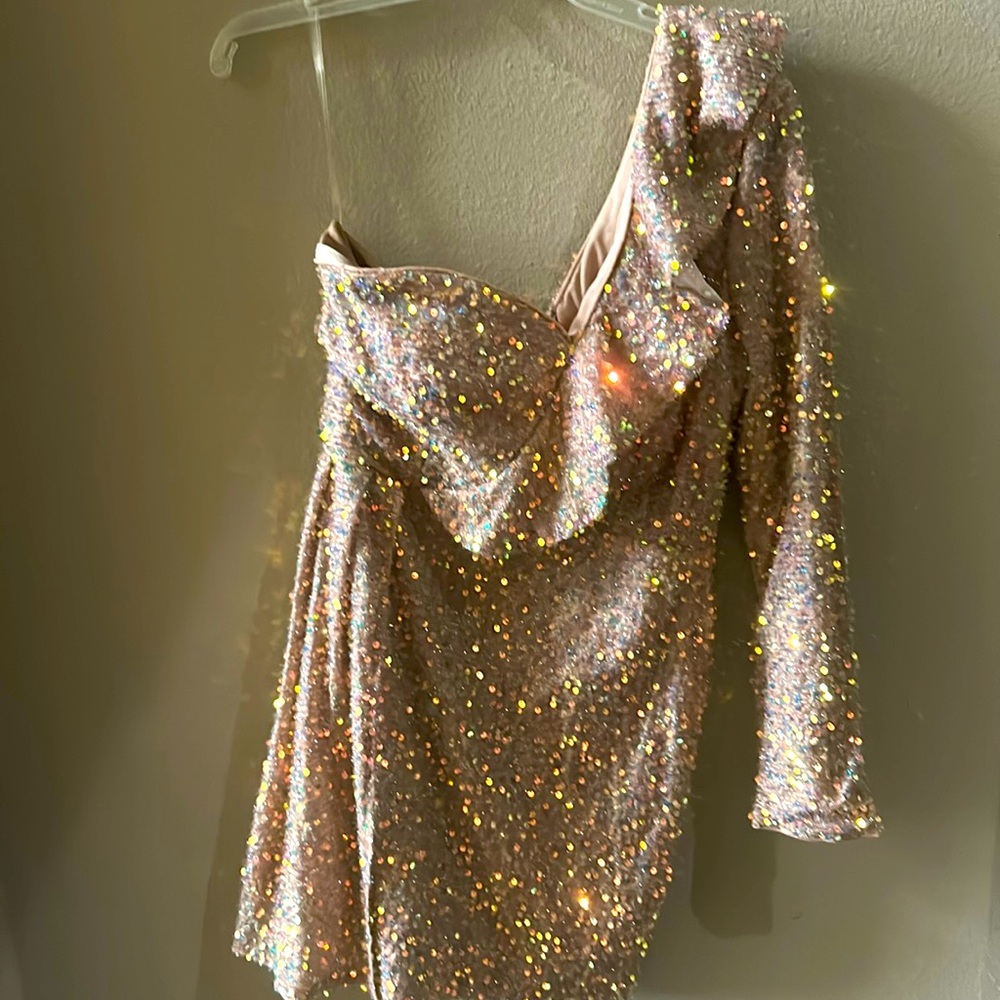 Fun sequence dress  never worn tag still on it no damages good condition